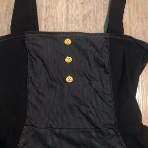 Black with pinstripes and orange stitching.fit and flair dress. Pumpkin buttons
